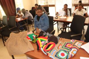 Congo's Sarah Kubuya, displaying knitted fabrics