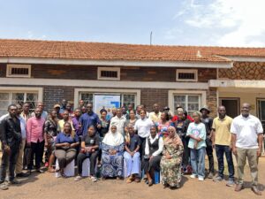 Attendees pose for a group picture at the FGD that was hosted at their premises
